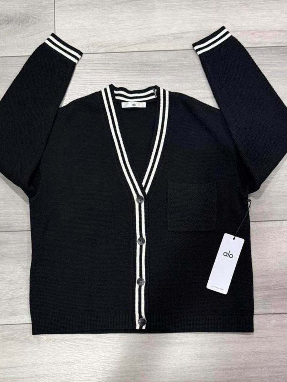 ALO Yoga Black Tennis Club Sweater Knit Cardigan with Ivory Stripes Trim.